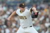 FILE - San Diego Padres starting pitcher Michael King works against an Arizona Diamondbacks batter during the second inning of a baseball game Saturday, Sept. 27, 2025, in San Diego. (AP Photo/Gregory Bull, File)