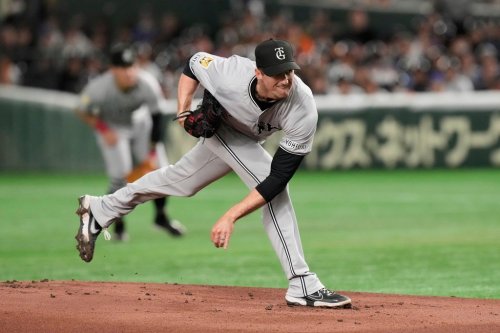 FILE - Yomiuri Giants pitcher Foster Griffin throws to the Chicago Cubs in the first inning of an MLB Japan Series exhibition baseball game in Tokyo, Japan, Sunday, March 16, 2025. (AP Photo/Eugene Hoshiko, File)