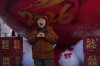 A child poses for a photo with a prosperity decoration to welcome 2026 Year of the Horse, following the Chinese zodiac at a shopping district on new year's eve, in Beijing, Wednesday, Dec. 31, 2025. (AP Photo/Andy Wong)