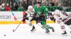 Dallas Stars left wing Jason Robertson (21) skates for the puck against Chicago Blackhawks center Dominic Toninato (25) and defenseman Alex Vlasic during the first period of an NHL hockey game Saturday, Dec. 27, 2025, in Dallas. (AP Photo/LM Otero)