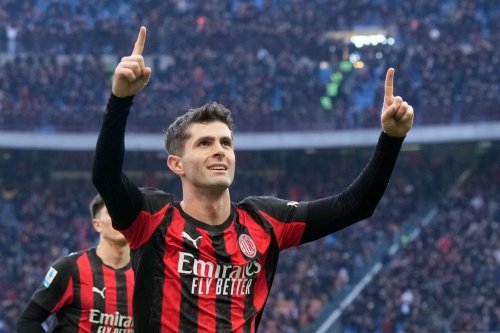 AC Milan's Christian Pulisic celebrates after scoring his side's first goal during a Serie A soccer match between AC Milan and Hellas Verona, in Milan, Italy, Sunday, Dec. 28, 2025. (AP Photo/Luca Bruno)