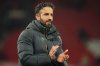 Manchester United's head coach Ruben Amorim walks on the pitch at the end of the English Premier League soccer match between Manchester United and West Ham United in Manchester, England, Thursday, Dec. 4, 2025. (AP Photo/Ian Hodgson)