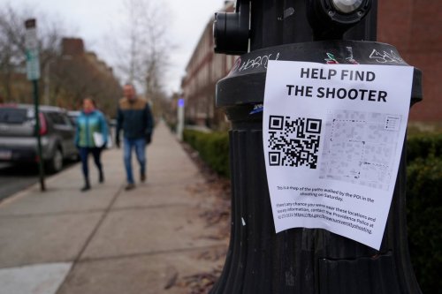 A poster seeking information about the campus shooting suspect is seen on the campus of Brown University, Wednesday, Dec. 17, 2025, in Providence, R.I. (AP Photo/Robert F. Bukaty)