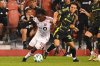 Toronto FC's Malik Henry (left) fights for possession of the ball against Columbus Crew's Hugo Picard during second half MLS soccer action in Toronto on Saturday, Aug. 16, 2025. THE CANADIAN PRESS/Jon Blacker