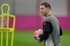 Bayern's goalkeeper Manuel Neuer arrives for a training session in Munich, Germany, Monday, Dec. 8, 2025, ahead of the Champions League opening phase soccer match between FC Bayern and Sporting Lisbon. (AP Photo/Matthias Schrader)