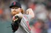 FILE - Boston Red Sox starting pitcher Dustin May throws against the Houston Astros during the first inning of a baseball game, Aug. 12, 2025, in Houston. (AP Photo/David J. Phillip, File)