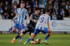 Real Madrid's Franco Mastantuono, center, duels for the balls with Talavera's Iaiah Jeronimo during the Copa del Rey soccer match between Talavera and Real Madrid, in Talavera de la Reina, Spain, Wednesday, Dec. 17, 2025. (AP Photo/M. Berengui)