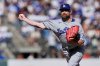 FILE - Los Angeles Dodgers pitcher Kirby Yates throws to a San Francisco Giants batter during the ninth inning of a baseball game Sunday, Sept. 14, 2025, in San Francisco. (AP Photo/Godofredo A. Vásquez,File)