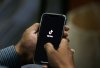 FILE - In this July 21, 2020 file photo, a man opens social media app 'TikTok' on his cell phone, in Islamabad, Pakistan. (AP Photo/Anjum Naveed, File)