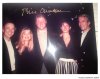 This undated photo released by Democrats on the House Oversight Committee shows former President Bill Clinton, Ghislaine Maxwell and Jeffrey Epstein, with Clinton's signature at the top of the photo. (House Oversight Committee via AP)