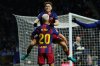 Barcelona's Dani Olmo (20) is congratulated by Fermin Lopez after scoring his side's opening goal during the Spanish La Liga soccer match between RCD Espanyol and Barcelona in Barcelona, Spain, Saturday, Jan. 3, 2026. (AP Photo/Joan Monfort)