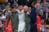 Real Madrid's Eder Militao is assisted from the pitch after getting an injury during the Spanish La Liga soccer match between Real Madrid and Celta Vigo in Madrid, Spain, Sunday, Dec. 7, 2025. (AP Photo/Manu Fernandez)