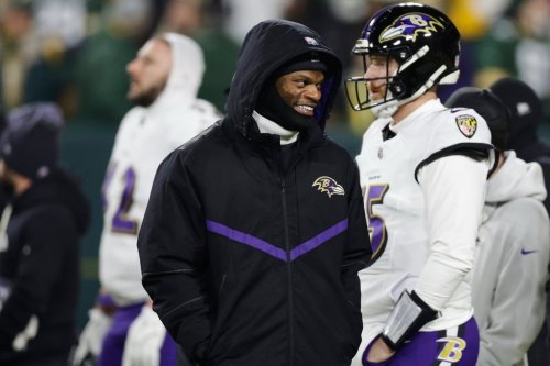 Baltimore Ravens quarterback Lamar Jackson watches on the field during pre-game warm ups before an NFL football game against the Green Bay Packers, Saturday, Dec. 27, 2025, in Green Bay, Wis. (AP Photo/Matt Ludtke)