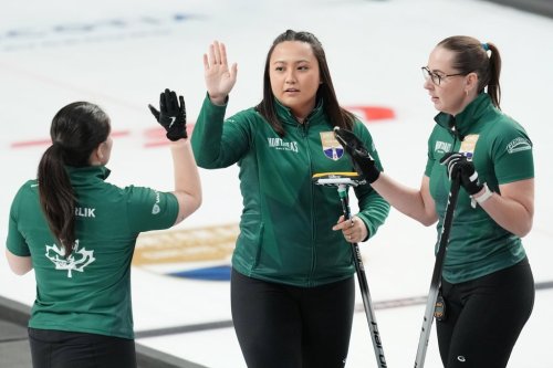 Kayla Skrlik celebrates with teammates during a game against Team Black at the Montana's Canadian Curling Trials in Halifax on Nov. 25, 2025. THE CANADIAN PRESS/Darren Calabrese
