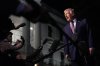 FILE - President Donald Trump talks to the media as he walks to Marine One from the White House, Friday, Dec. 19, 2025, in Washington. (AP Photo/Julia Demaree Nikhinson, File)