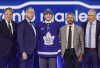 Ben Danford, centre, after being selected by the Toronto Maple Leafs in the first round of the NHL draft in Las Vegas on Friday, June 28, 2024. (AP Photo/Steve Marcus)