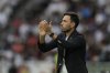 FILE - Coach Davide Ancelotti of Brazil's Botafogo instructs his players during a Copa Libertadores round of sixteen second leg soccer match against Ecuador's Liga Deportiva Universitaria at Rodrigo Paz Delgado stadium in Quito, Ecuador, Aug. 21, 2025. (AP Photo/Dolores Ochoa, File)