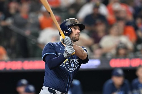 FILE - Tampa Bay Rays Brandon Lowe follows through on a solo home run against the Baltimore Orioles in the third inning of a baseball game, Wednesday, Sept. 24, 2025, in Baltimore. (AP Photo/Gail Burton, File)