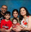 Prashanth Sreekumar, 44, shown in this undated handout photo with his wife and three children.  THE CANADIAN PRESS/Handout