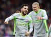 Manchester City's Rayan Cherki, left, celebrates with Erling Haaland after scoring his side's second goal during the Premier League match between Nottingham Forest and Manchester City, in Nottingham, England, Saturday Dec. 27, 2025. (Barrington Coombs/PA via AP)
