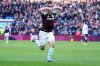 Aston Villa's John McGinn celebrates scoring their side's third goal during their English Premier League soccer match in Birmingham, England, Saturday, Jan. 3, 2026. (Martin Rickett/PA via AP)