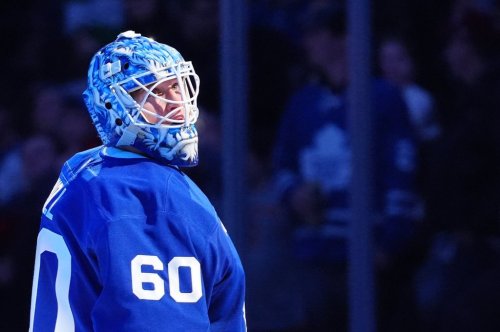Toronto Maple Leafs goaltender Joseph Woll (60) looks up towards the lights after picking up a shutout against the New Jersey Devils in NHL hockey action in Toronto on Tuesday Dec. 30, 2025. THE CANADIAN PRESS/Frank Gunn