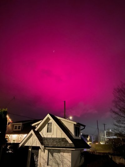 A purple haze in the sky above Metro Vancouver is shown in this undated handout photo captured by local resident Catherine Latremouille. THE CANADIAN PRESS/Handout — Catherine Latremouille (Mandatory Credit)