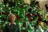 White House Chief of Staff Susie Wiles looks up surrounded by Christmas Trees at the White House, Friday, Dec. 5, 2025, in Washington. (AP Photo/Allison Robbert)