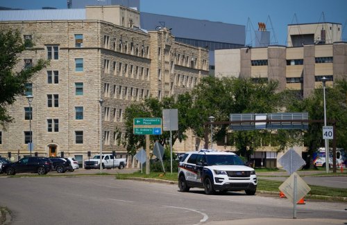 A police vehicle can be seen outside of the Royal University Hospital in Saskatoon, on Wednesday, July 17, 2024. THE CANADIAN PRESS/Heywood Yu