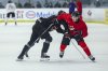 Gavin McKenna, of Whitehorse, Yukon, tries to move past Jackson Smith, of Calgary, Alta., during Canada's National Junior Team training camp in Niagara Falls, Ont., Saturday, Dec. 13, 2025. THE CANADIAN PRESS/Nick Iwanyshyn