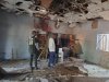 People inspect the scene of a deadly bomb explosion inside a mosque in Maiduguri, Nigeria, Thursday, Dec. 25, 2025. (AP Photo/Jossy Ola )