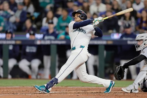 FILE - Seattle Mariners' Jorge Polanco hits a solo home run off Detroit Tigers starting pitcher Tarik Skubal during the sixth inning in Game 2 of baseball's American League Division Series, Sunday, Oct. 5, 2025, in Seattle. (AP Photo/John Froschauer, File)