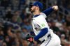 FILE - Toronto Blue Jays pitcher Zach Pop throws to a New York Mets batter in the seventh inning of a baseball game in Toronto on Tuesday Sept. 10, 2024. (Jon Blacker/The Canadian Press via AP,File)