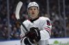 Chicago Blackhawks' Connor Bedard (98) waits for a face off against the Vancouver Canucks during the third period of an NHL hockey game in Vancouver, B.C., on Saturday, March 15, 2025. THE CANADIAN PRESS/Ethan Cairns