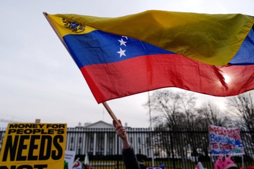 Protesters rally outside the White House Saturday, Jan. 3, 2026, in Washington, after the U.S. captured Venezuelan President Nicolás Maduro and his wife in a military operation. (AP Photo/Julia Demaree Nikhinson)