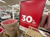 Sign shows discount available on seasonal items in a Kohl's department store, Monday, Dec. 8, 2025, in Castle Rock, Colo. (AP Photo/David Zalubowski)
