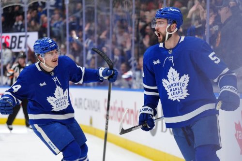 Toronto Maple Leafs centre Nicolas Roy (55) celebrates his goal against the New Jersey Devils with teammate Bobby McMann (74) during second period NHL hockey action in Toronto on Tuesday Dec. 30, 2025. THE CANADIAN PRESS/Frank Gunn