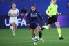 Arsenal's Olivia Smith runs with the ball during the women's Champions League opening phase soccer match between OH Leuven and Arsenal, in Leuven, Belgium, Wednesday, Dec. 17, 2025. (AP Photo/Omar Havana)