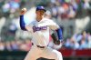 FILE - Texas Rangers starting pitcher Tyler Mahle throws against the Minnesota Twins during the first inning of a baseball game Sept. 25, 2025, in Arlington. (AP Photo/Julio Cortez, File)