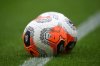 FILE - Balls lie on the pitch prior to the English Premier League soccer match between Norwich City and Brighton & Hove Albion at Carrow Road Stadium in Norwich, England, Saturday, July 4, 2020. (Joe Giddens/Pool Photo via AP, File)