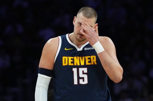 Denver Nuggets center Nikola Jokic (15) walks on the court during the first half of an NBA basketball game against the Miami Heat, Monday, Dec. 29, 2025, in Miami. (AP Photo/Lynne Sladky)