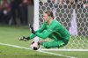 PSG's goalkeeper Matvey Safonov stop a ball in the penalty shootout during the FIFA Intercontinental Cup final soccer match between Flamengo and Paris Saint-Germain in Doha, Qatar, Wednesday, Dec. 17, 2025. (AP Photo/Hussein Sayed)