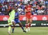 Canada's Evelyne Viens (24) scores against Haiti's goalkeeper Kaina Cesar Pietrus (1) during first half international friendly soccer action in Montreal, Tuesday, June 3, 2025. THE CANADIAN PRESS/Graham Hughes