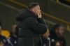 Wolverhampton Wanderers' head coach Vitor Pereira reacts during the Premier League soccer match between Wolverhampton Wandere and Manchester United in Wolverhampton, England Monday, Dec. 8, 2025. (AP Photo/Dave Shopland)