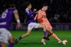 Guadalajara's Samu Mayo, left, vies for the ball with Barcelona's Andreas Christensen during the Copa del Rey soccer match between Guadalajara and Barcelona in Guadalajara, Spain, Tuesday, Dec. 16, 2025. (AP Photo/Rudy Garcia)