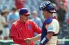 FILE - Philadelphia Phillies manager Rob Thomson celebrates a win against the Chicago Cubs with Phillies' J.T. Realmuto during a baseball game, June 11, 2025, in Philadelphia. (AP Photo/Matt Slocum, File)