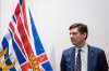 B.C. Premier David Eby waits for a meeting on new funding to support victims of crime in Surrey, B.C., Friday, Nov. 28, 2025. THE CANADIAN PRESS/Ethan Cairns