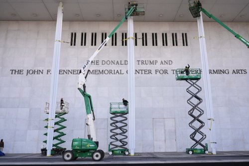 New signage, The Donald J. Trump and The John F. Kennedy Memorial Center For The Performing Arts, is unveiled on the Kennedy Center, Friday, Dec. 19, 2025, in Washington. (AP Photo/Jacquelyn Martin)