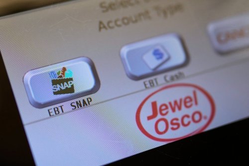FILE - An EBT SNAP sign is shown on a self check out screen at a grocery store in Mount Prospect, Ill., Saturday, Nov. 1, 2025. (AP Photo/Nam Y. Huh, File)