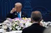 U.S. President Donald Trump looks toward Prime Minister Mark Carney as they raise their glasses during a toast at a working dinner in Gyeongju, South Korea, on Wednesday, Oct. 29, 2025. THE CANADIAN PRESS/Adrian Wyld